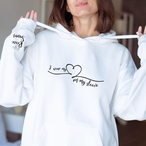 AOVL Personalized Embossed I Wear My Heart On My Sleeve Sweatshirt, Custom Mama Sweatshirt With Name On Sleeve, Gift For Mom